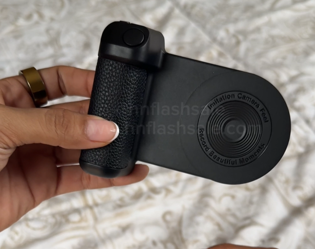 Mango magnético tipo cámara para celular